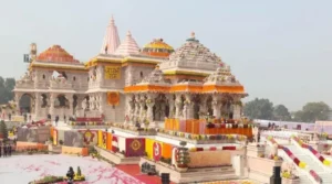 a large white building with colorful decorations, ram mandir
